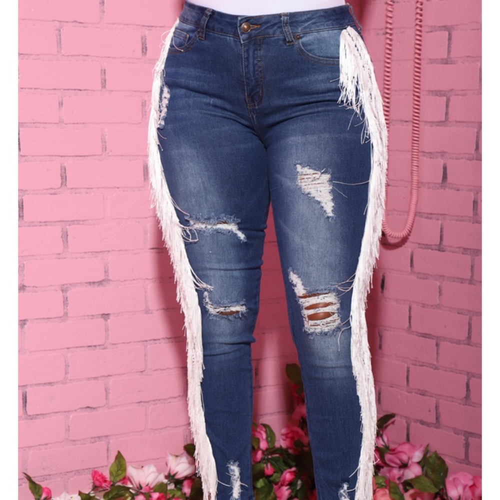 Denim jeans with white tassels